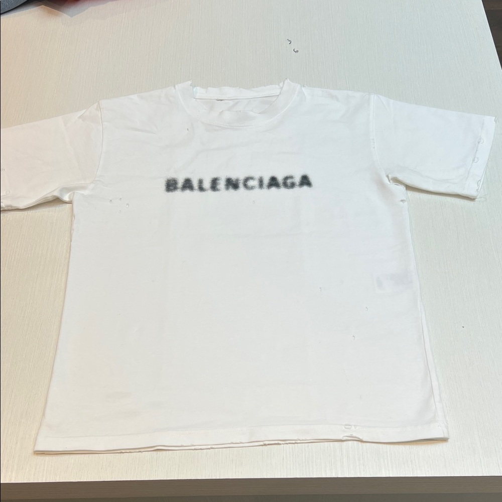 Authentic Balenciaga distressed t-shirt with logo